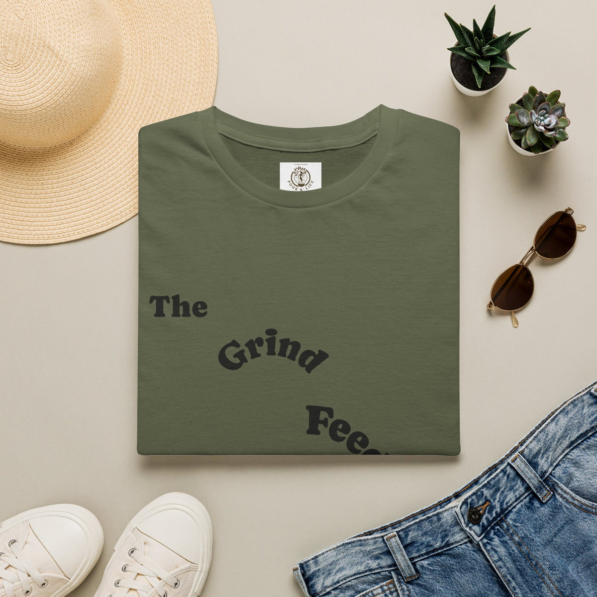 T-Shirt — “The Grind Feeds the Pockets” (Back) The Peace Feeds The Soul.