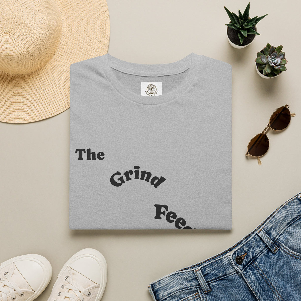T-Shirt — “The Grind Feeds the Pockets” (Back) The Peace Feeds The Soul.