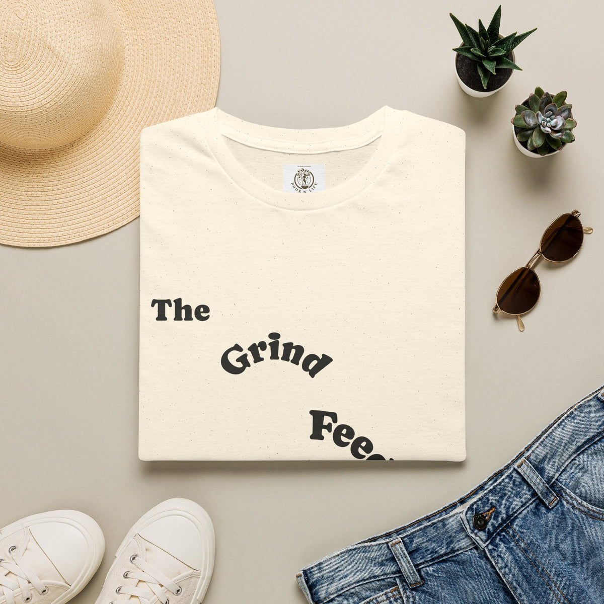 T-Shirt — “The Grind Feeds the Pockets” (Back) The Peace Feeds The Soul.